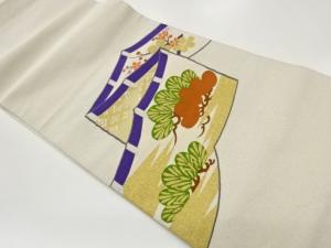 綴れ幕に梅・松・雲模様織出し名古屋帯